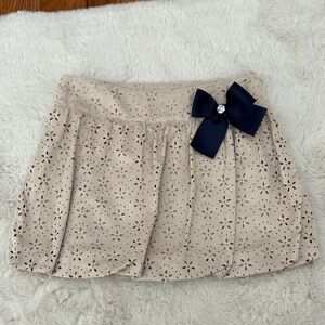 Elegant Beige Skirt with Navy Bow